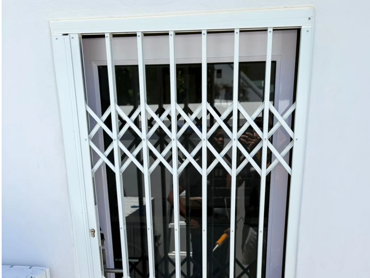 Retractable Security Gate - Compact folding security gate