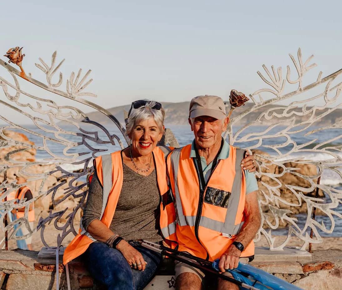 Keep Plett Clean team members in orange safety vests at the Plettenberg Bay coastline